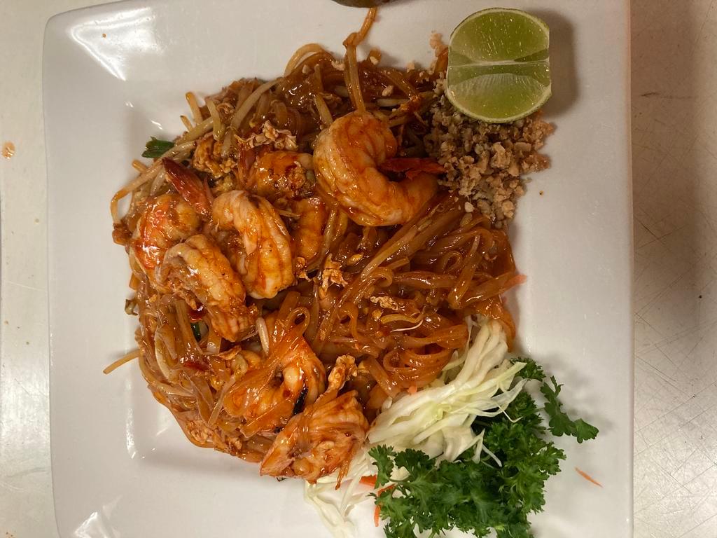 PAD THAI NOODLE  · rice noodle with egg, bean sprout scallion in a mixture of tamarind palm, contains crushed peanuts lime