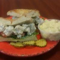 Manhattan Chicken Salad · Chicken salad on a sesame bagel.Includes pickle and a side of potato salad.