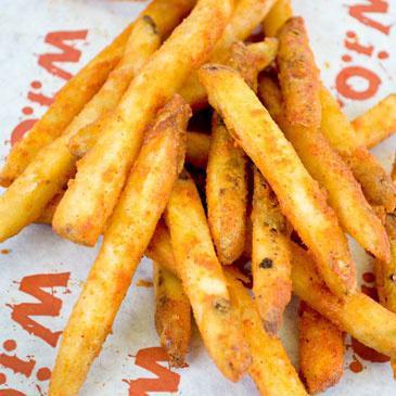 Straight Cut Fries · Crispy seasoned fries tossed in or classic fry seasoning or any WIO dry rub. Simply irresistible!