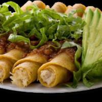 Flautas · 4 corn tortillas stuffed with chicken, topped with salad. Served with rice and beans.