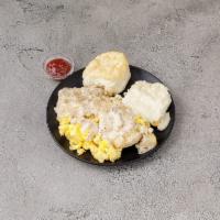 Biscuit, Eggs and Gravy · Split biscuit topped with 2 scrambled eggs, smothered with chicken sausage gravy, served wit...