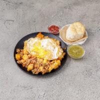 Chorizo Hash · Chicken chorizo, breakfast potatoes, red and green peppers, onions and cheddar cheese, toppe...