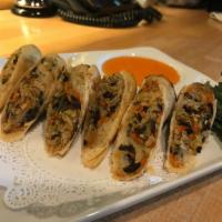 EGG ROLLS · Shredded cabbage, Carrot, and Glass noodles in Egg rolls wrapper & Fried, Served with Homema...