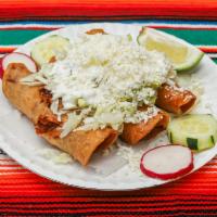 Tacos Dorados · 3 deep-fried tacos stuffed with your choice of meat. Topped with cheese, cream , lettuce, be...