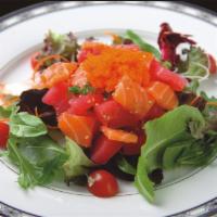 6. Sashimi Salad · Tuna, salmon, white fish, cucumber, daikon, on gourmet spring mix with house and mayo sauce ...