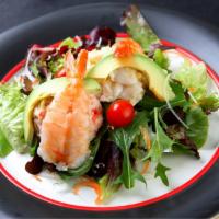 8. Seafood Salad · Shrimp, fresh scallop, crab, cucumber, marinated seaweed and daikon on top of gourmet spring...