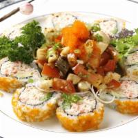40. Valencia Roll · Baked scallop, mushrooms, tomato, masago, green onion over California roll with sesame oil a...