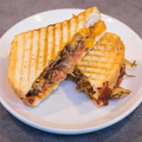 Pulled Pork Panini · BBQ pulled pork, tomato, cheddar and BBQ sauce.
