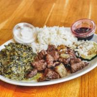 Steak Plate · Filet tips, caramelized onion, zucchini, rice, creamed kale and spinach, red wine glaze and ...