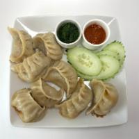 Momo  · Homemade dumplings that are steamed with different types of filling. We offer pork, chicken,...