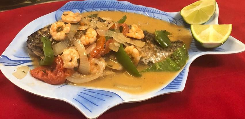 Mojarra al Vapor con Camarones · Steamed fish tilapia with shrimp. Served with rice, beans, salad, and 2 tortillas.