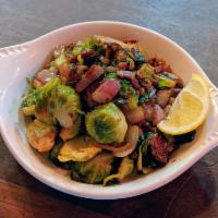  Sauteed Brussels Sprouts with Bacon · bacon, olive oil, lemon, red onions and butter.