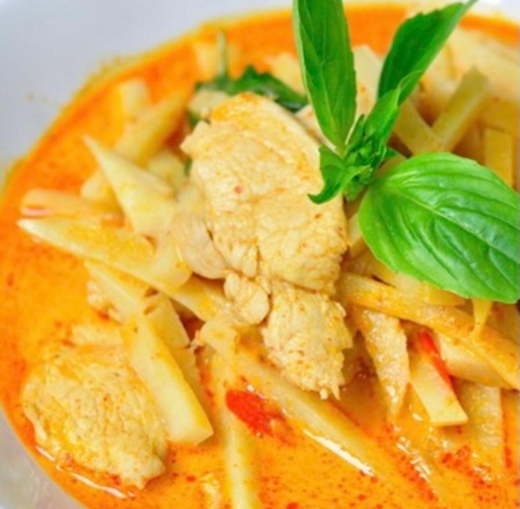 27. Red Curry · Red chili curry soup with bamboo, shoots, coconut milk, basil, peppers and your choice of meat.