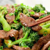 28. Beef Broccoli · Marinated beef sauteed with broccoli and carrots.