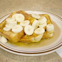 Bahama Rum French Toast · 3 slices of thick Texas bread grilled in egg batter, topped with bananas and our homemade ru...