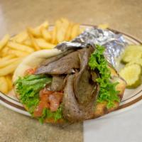 Gyros Sandwich · Seasoned beef and lamb slices in a grilled pita with onions, lettuce, tomatoes and tzatziki ...