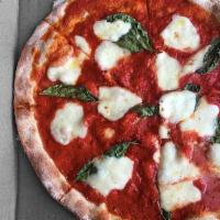 Margherita Pizza · Classic red sauce, fresh mozzarella and fresh basil, finished with extra virgin olive oil. V...