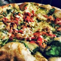 Greko Pizza · Basil pesto, spicy chicken sausage, spinach, roasted red peppers, feta cheese and Napa chees...