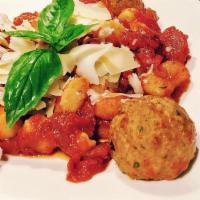 Marinara and Meatball Gnocchi · Rustic marinara, meatballs, roasted red pepper, caramelized onions, finished with Asiago.