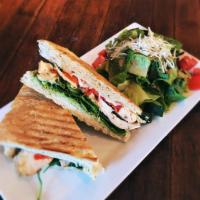 Chicken Pesto Panini · Fire roasted chicken, fire roasted red peppers, spinach, basil pesto, mozzarella and provolo...