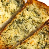 Garlic Bread · Fresh French roll with garlic butter.