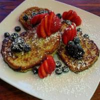 Gluten Free French Toast · Topped with fresh berries.