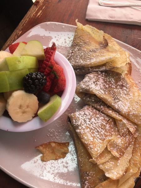 Hazelnut Chocolate Crepes · Nutella with bananas or strawberries. Served with a side of fruit.