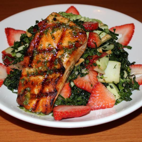 Black Kale and Apple Salad · Fine chopped black kale, green apples, fresh strawberries, toasted almonds and avocado, tossed with our fresh lemon vinaigrette.