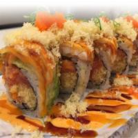 Akira Special Roll · Spicy tuna and crunch in, top with red snapper tempura, avocado.