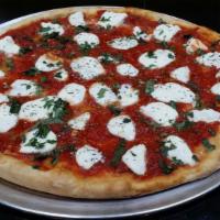 Margherita Pizza · Plum tomato, fresh mozzarella and basil.