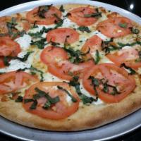 Fresca Pizza · Ricotta, fresh sliced tomatoes and basil.