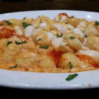 Gnocchi Sorrento Dinner · Mozzarella, basil, Parmigiana cheese and cream sauce. Served with choice of side, bread and ...
