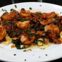 Shrimp Costa Verde Dinner · Over fettuccine. Fresh shrimp, sauteed with sun-dried tomatoes and spinach in a white wine s...
