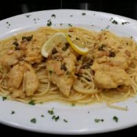 Piccata · Over spaghetti, sauteed garlic, capers, lemon and white wine. Served with choice of side, br...