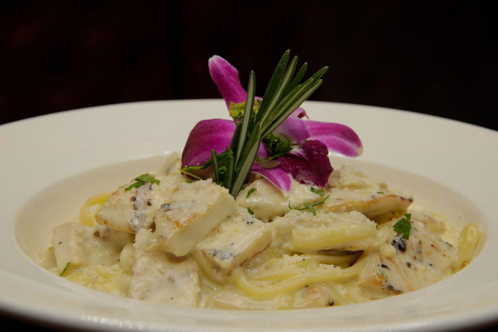 Linguini Alfredo · Add chicken and shrimp for an additional charge.