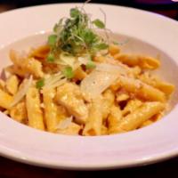 Penne a la Vodka · Penne pasta in a zesty vodka pink sauce. Add chicken and shrimp for an additional charge.