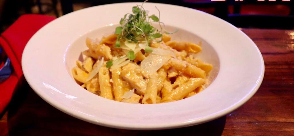 Penne a la Vodka · Penne pasta in a zesty vodka pink sauce. Add chicken and shrimp for an additional charge.