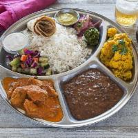 Thali Combo Plate · Combo plate. A homestyle meal with choice of two entrees. Includes daal, rice, salad, chutne...
