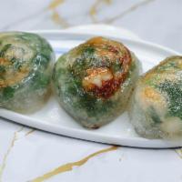 Pan Fried Chives Dumpling · Skin made with Tapioca flour. Thicker skin, pan fried, filled with Chives, shrimp, and pork ...