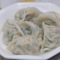 Steamed Pork and Chives Dumpling · Pork and chives dumplings steamed. 5 pieces