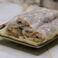 Beef Noodle Roll · Fresh, hand rolled noodle roll (CHEUNG FUN) or crepes filled with beef and cilantro. Comes w...