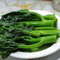 Chinese Broccoli with Oyster Sauce · Blanched chinese broccoli. Oyster sauce on the side. Family size. Ala Carte.

Not an accurat...
