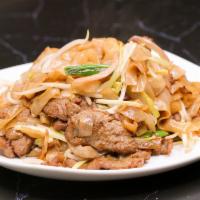 Beef Chow Fun · Flat rice noodles stir fried with beef 