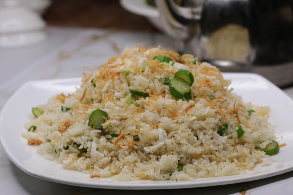 Dried Scallop with Egg White Fried Rice · One of our most popular fried rices. Dried scallop, egg white, broccoli rabe stems, and rice. Family size.  