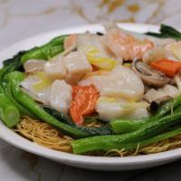 House Pan Fried Noodle · Crispy thin egg noodles. With an assortment of Seafood, pork, chicken. and a gravy. Family s...