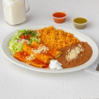 Enchiladas en Mole · Poblano style mole.