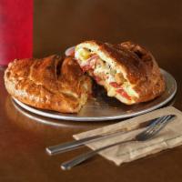 Calzone  · Small pizza folded in half, with your choice of cheese, sauce, and 3 toppings.
