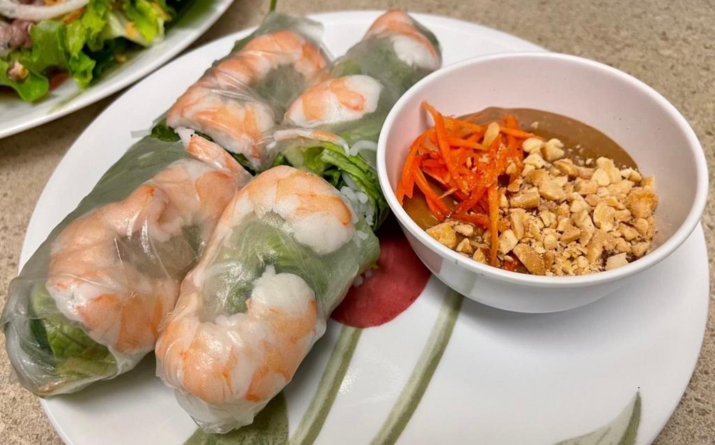 2. Summer Rolls · 2 pieces. Goi cuon. Choice of shrimp or vegetarian (tofu), served with mint, lettuce, vermicelli, rolled in rice paper and house-made peanut sauce.