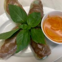4. BBQ Pork Rolls · Thit heo nuong cuon. Grilled bbq pork, mint, lettuce, bean sprouts, wrapped in rice paper.