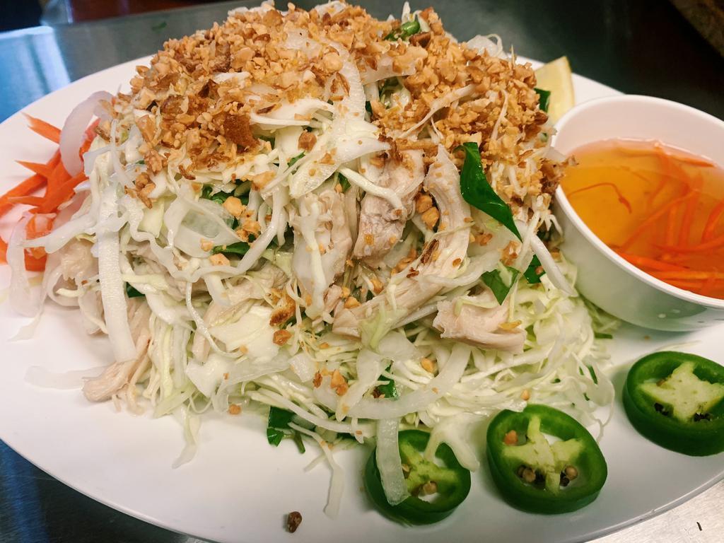 5. Chicken Salad · Xa lach ga. steamed boneless chicken, shredded cabbage, mint, carrot, toasted peanut, onion flakes in house made sauce. 